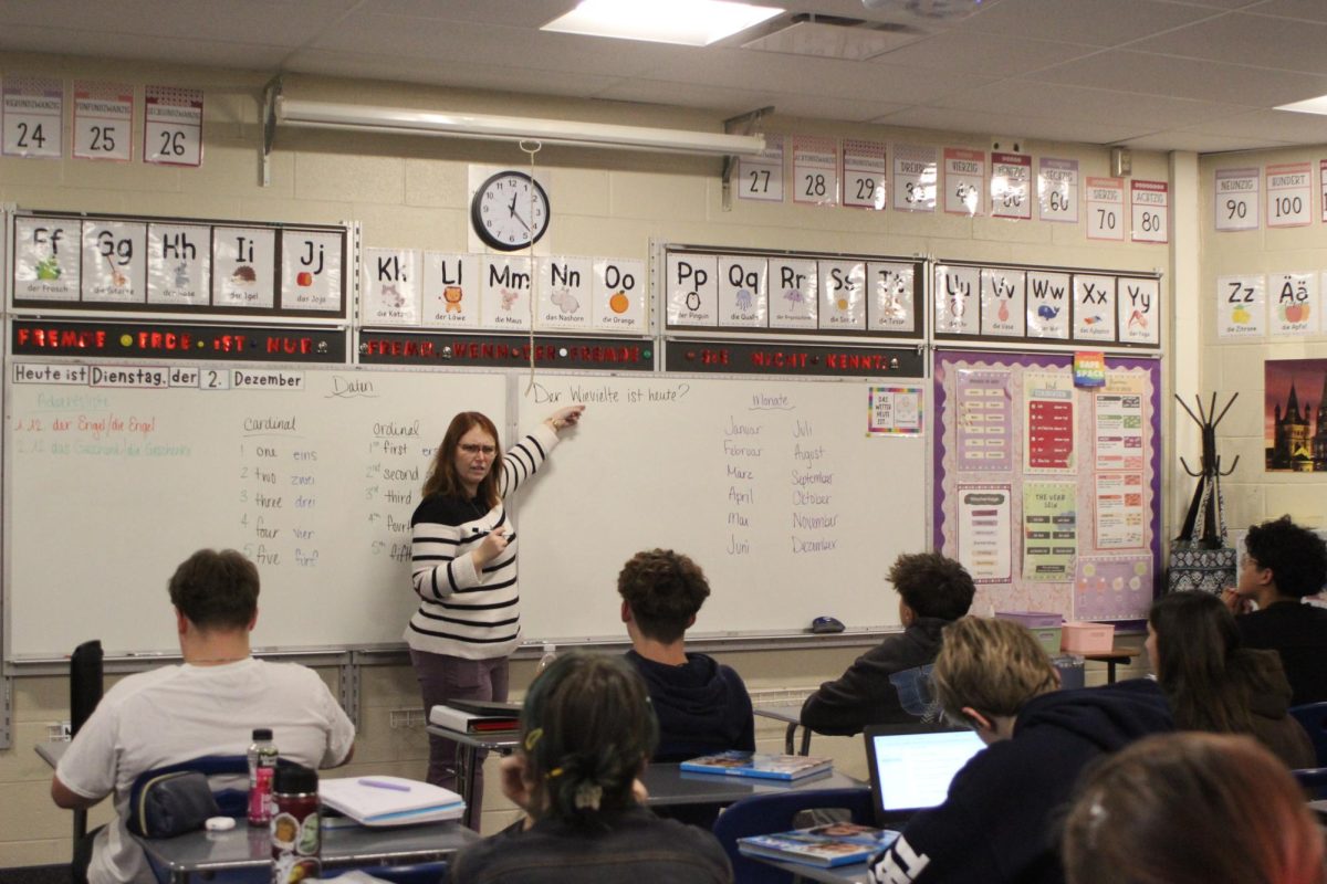 Megan Tredrea teaches German to a class full of students.